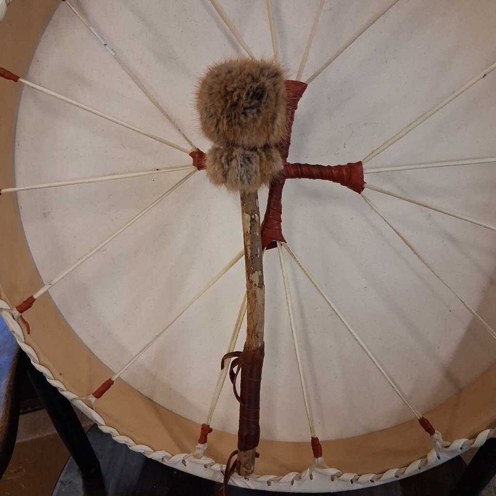 Traditional Native American shield with fur and leather details