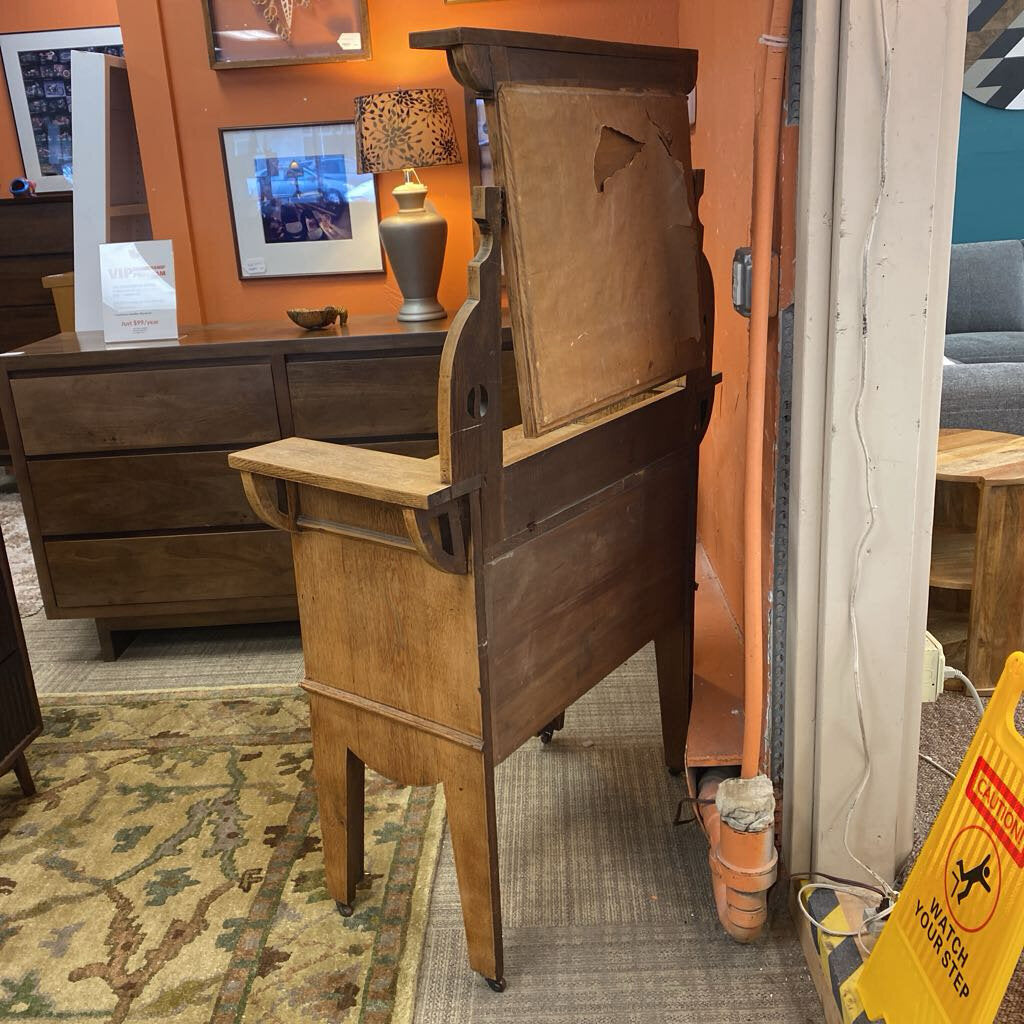 Wooden cabinet in a room with furniture and decor
