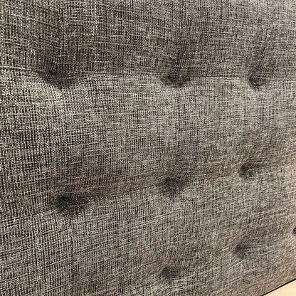 a speckled grey tufted fabric bed frame 