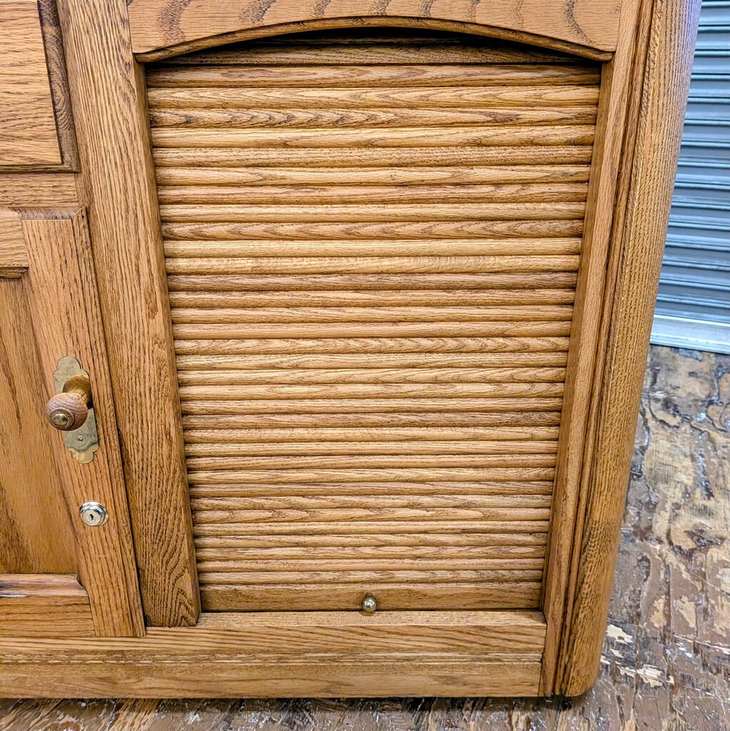 Wooden cabinet with a shutter door on a rustic background