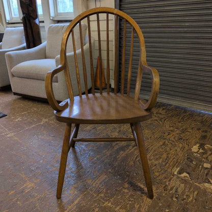 Wooden chair on a wooden floor with a blurred background