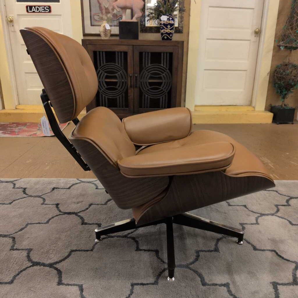 Brown lounge chair with ottoman on a patterned rug