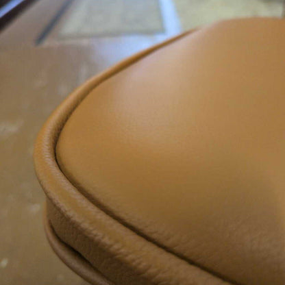 Close-up of a brown leather product on a surface