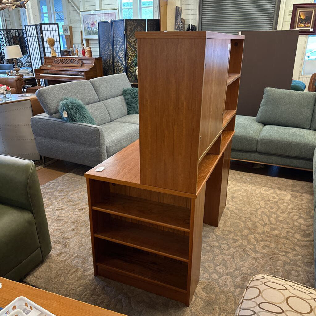 Wooden bookshelf in a room with furniture and decor