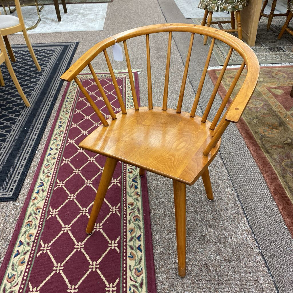 Wooden chair on a patterned rug