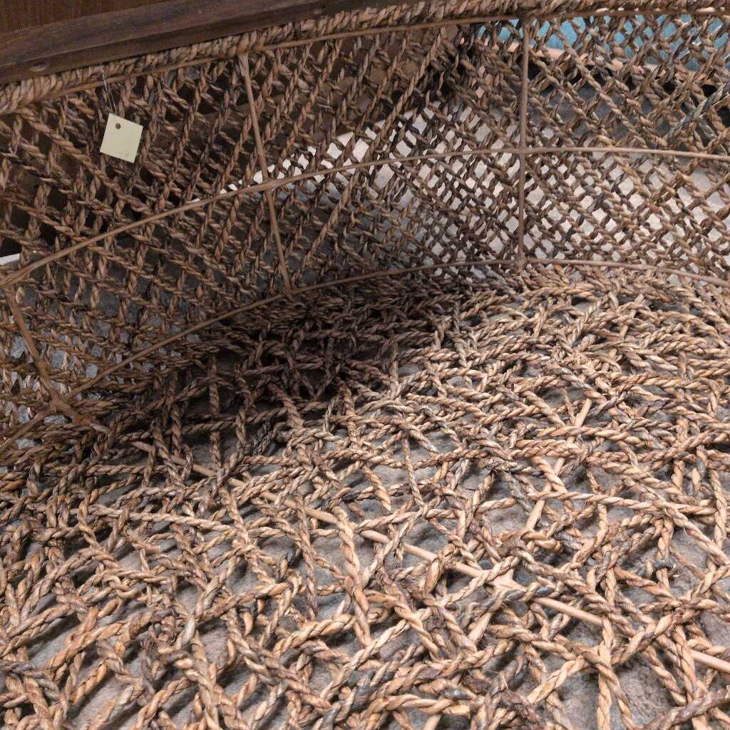 Close-up of a textured woven mat with intricate patterns