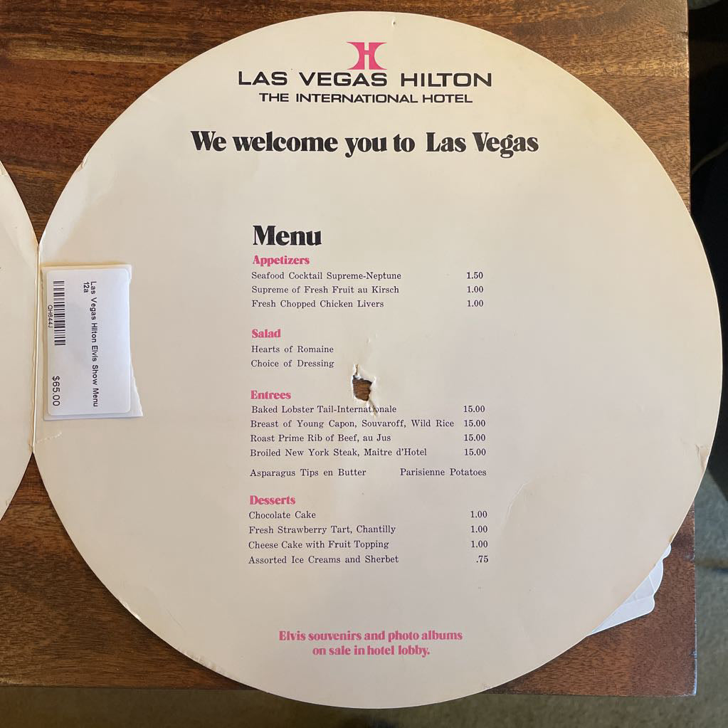 Las Vegas Hilton menu on a wooden table