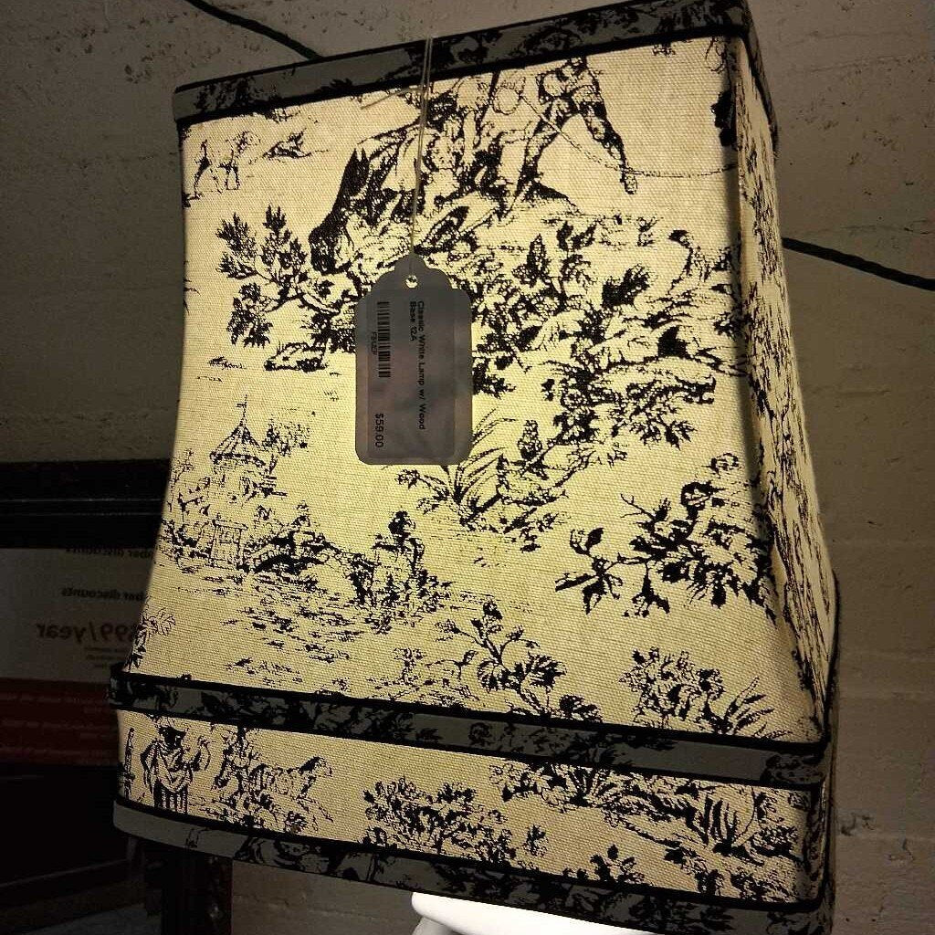 Decorative lampshade with black and white pattern on a plain background