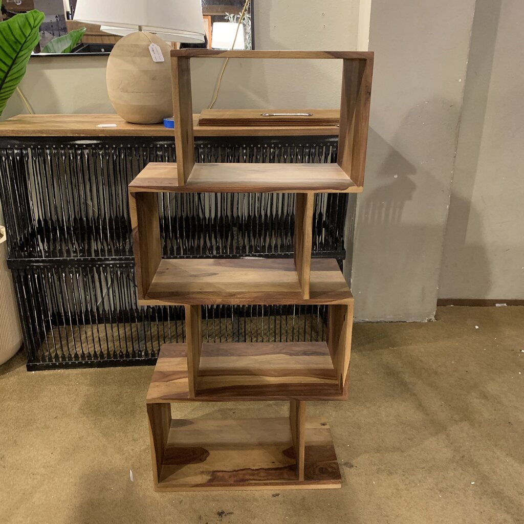 Wooden shelf with multiple levels in a store setting