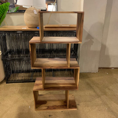 Wooden shelf with multiple levels in a store setting