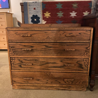 Oak 4 Drawer Chest with Floral Details