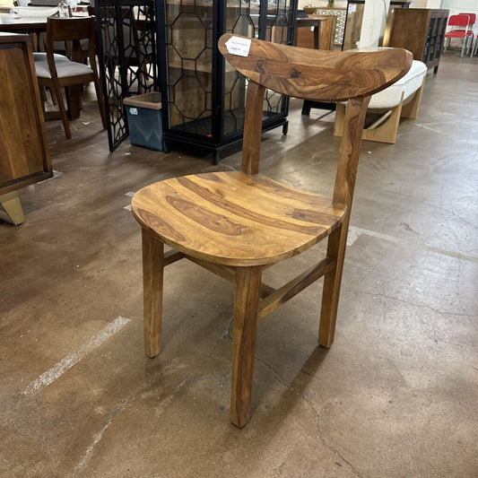 Wooden chair in a furniture store setting