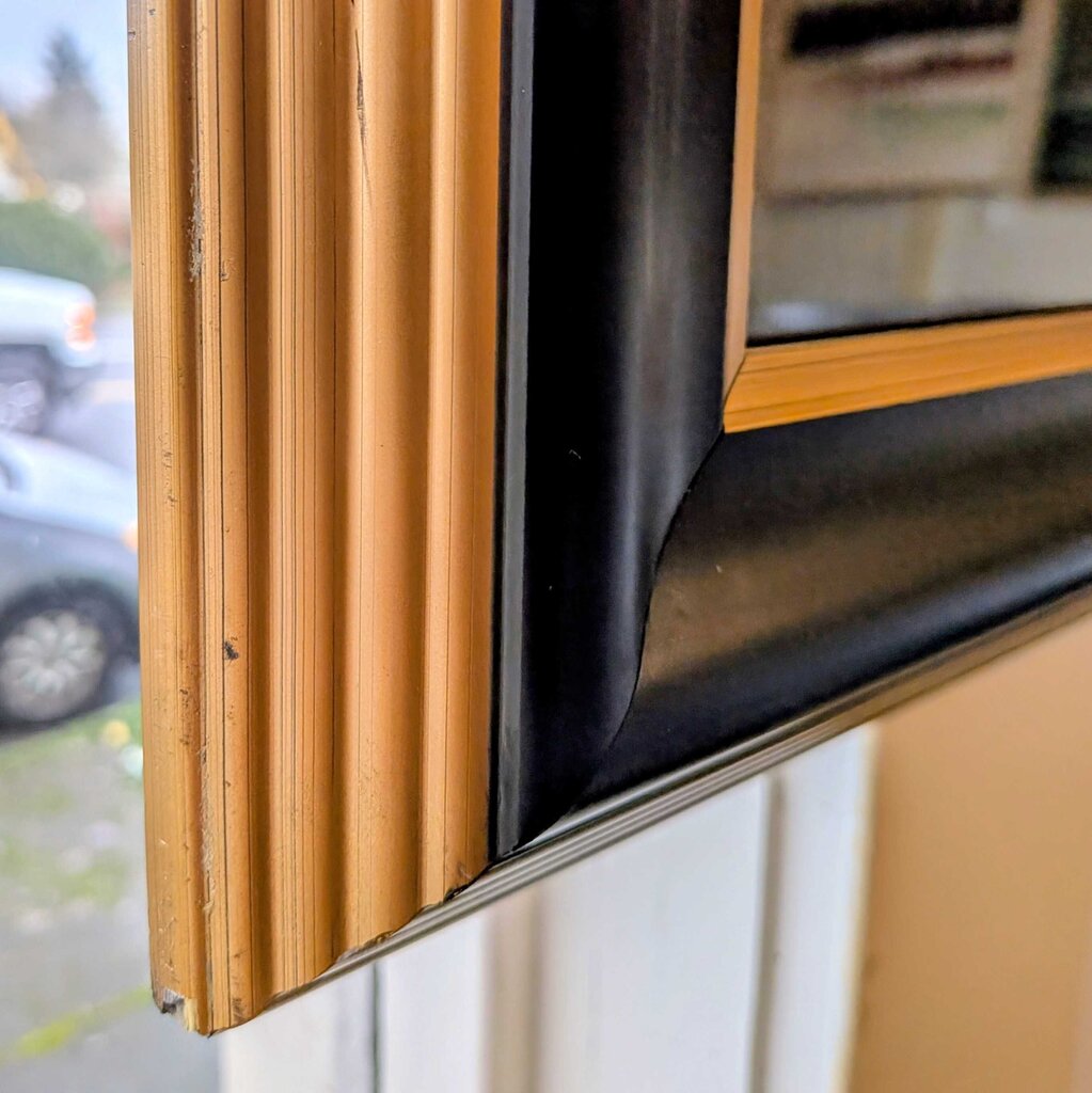 Close-up of a window frame with a blurred outdoor background