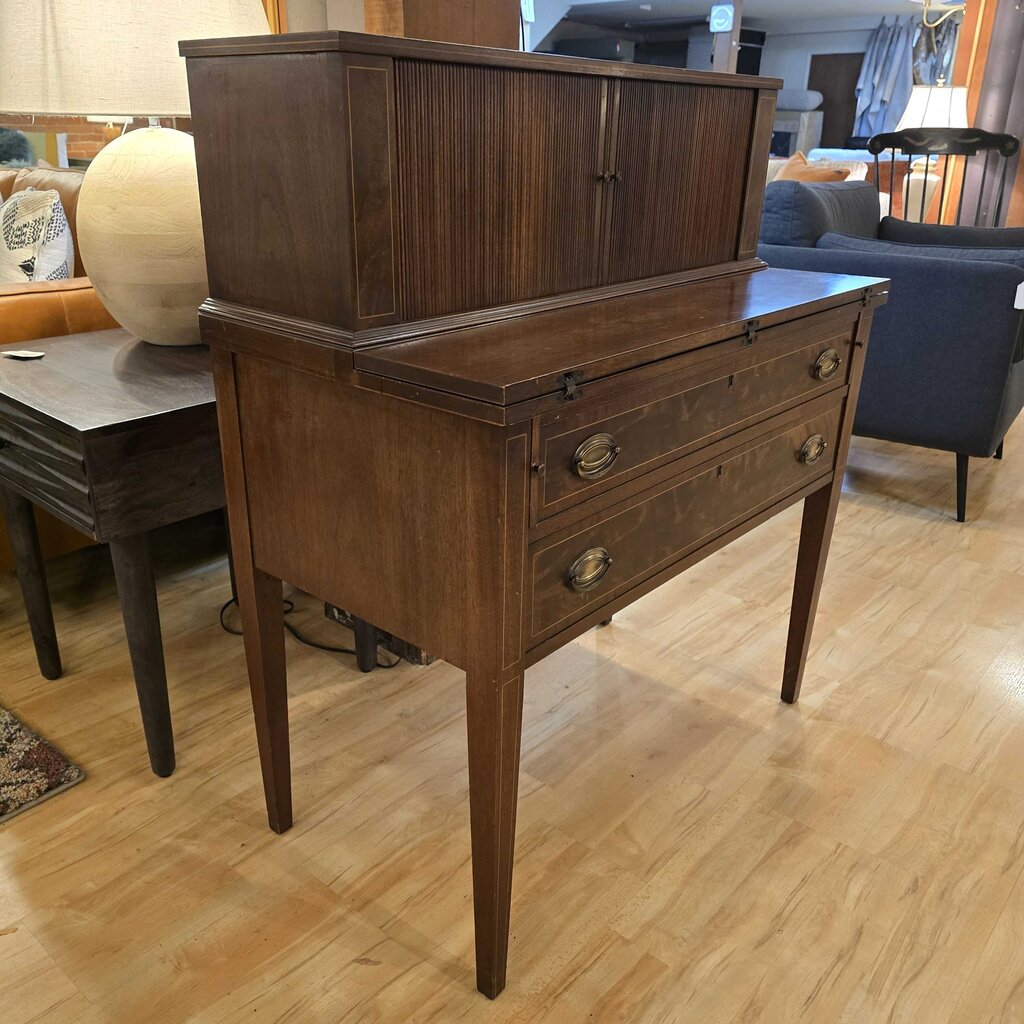 Wooden sideboard with two drawers and a cabinet in a living room setting