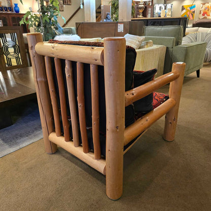 Wooden log-style chair in a furniture store setting