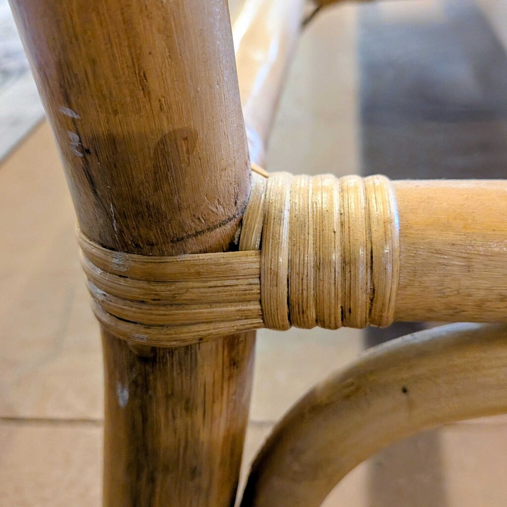 Close-up of woven bamboo furniture with a blurred background
