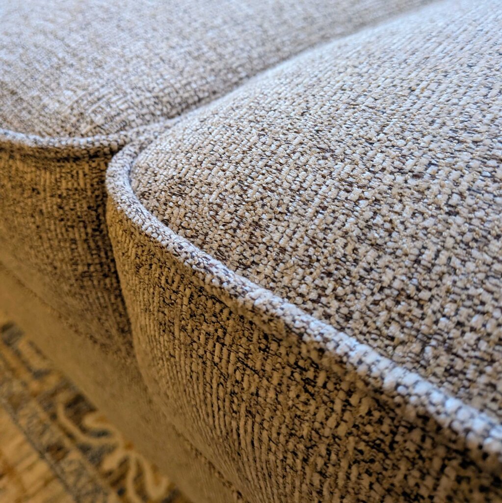 Close-up of textured beige carpet on a staircase