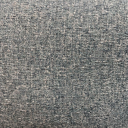 A light grey textured fabric sectional sofa featuring a left-arm-facing chaise with button-tufted seat cushions, two matching bolster pillows, and tapered wooden legs.