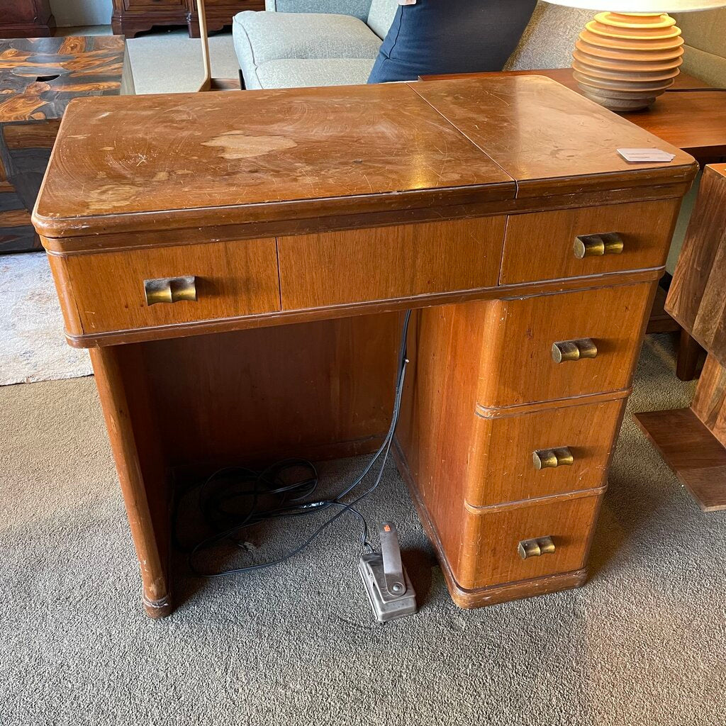 Wooden desk with drawers in a room setting