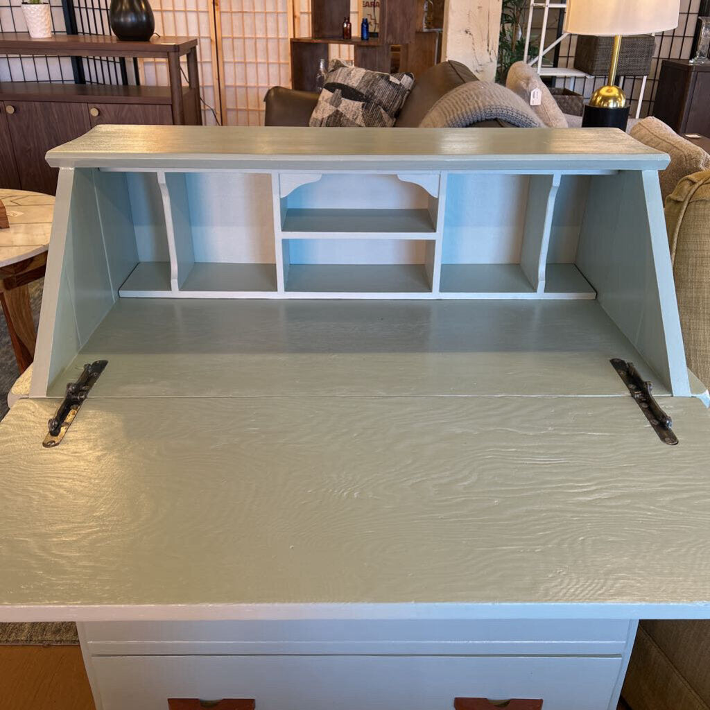 Wooden desk with a shelf in a room setting