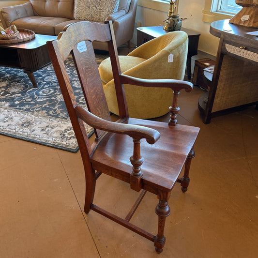 Wooden armchair in a room with furniture and decor