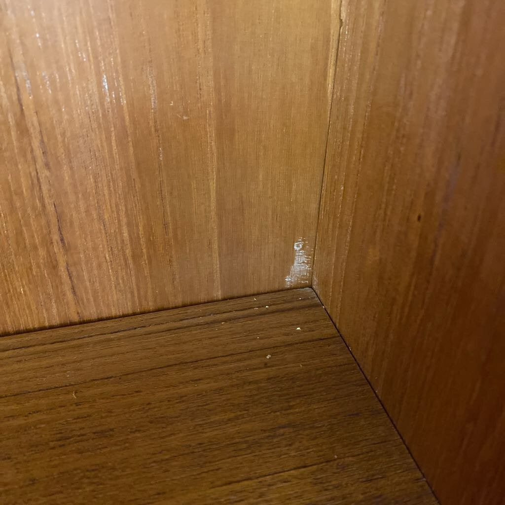 Close-up of a wooden surface with visible grain and texture