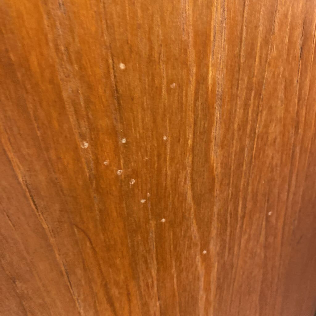 Close-up of a wooden surface with visible grain and texture
