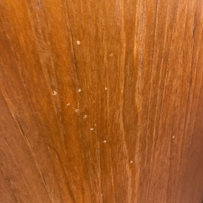 Close-up of a wooden surface with visible grain and texture