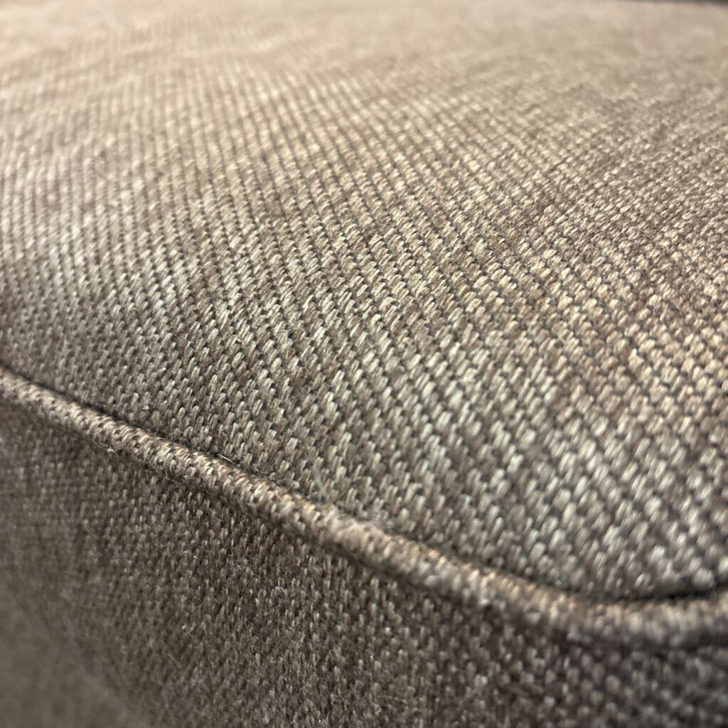 Close-up of a textured gray fabric surface