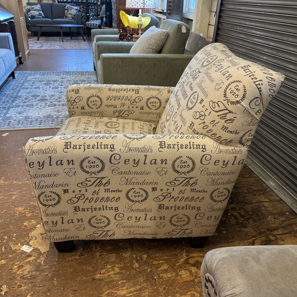 Patterned armchair in a room with other furniture