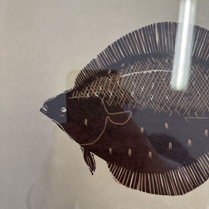 Illustration of a fish on a beige background