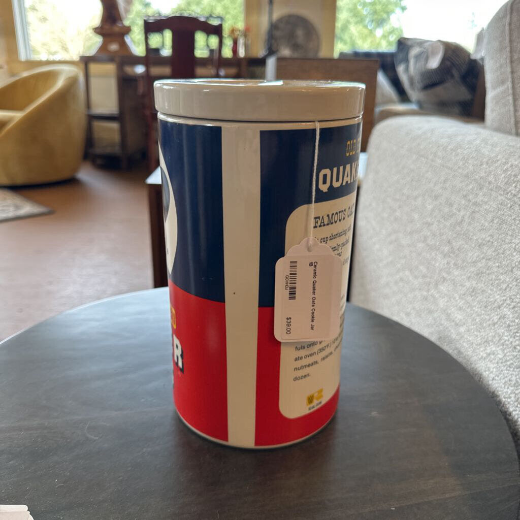 Canister with a label on a table in a living room setting