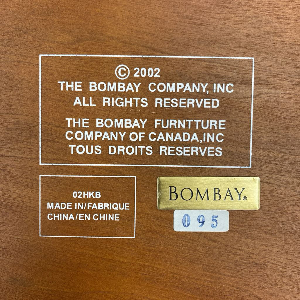 Wooden surface with branding and product information labels.