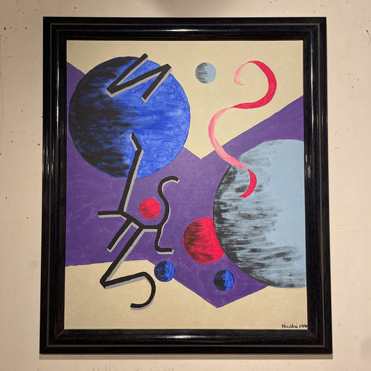 Abstract artwork with geometric shapes and a black frame on a beige wall.