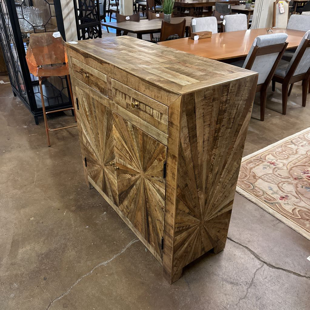 Wooden sideboard with geometric pattern in a store setting