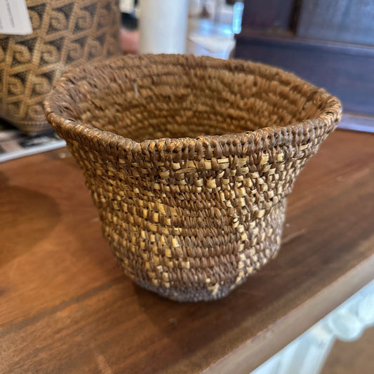 Woven basket on a wooden surface