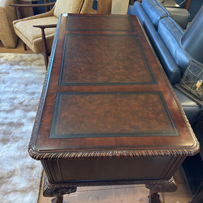 Vintage leather desk in a room with furniture