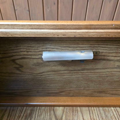 Light bulb inside a wooden cabinet