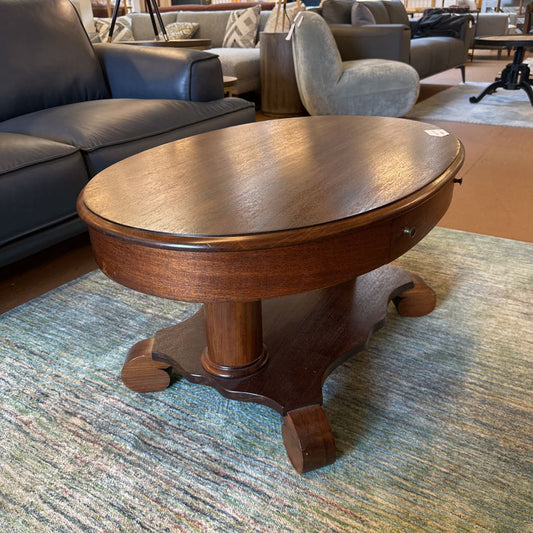 Wooden coffee table in a room with furniture