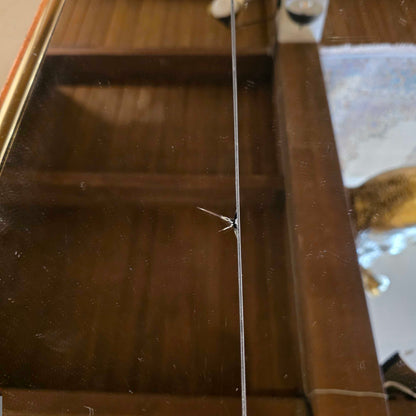 Close-up of a wooden surface with a clear plastic strip