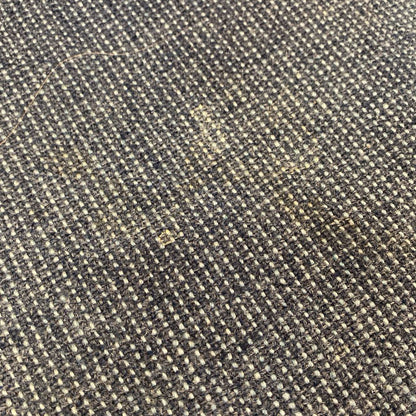 Close-up of textured fabric with a grid pattern