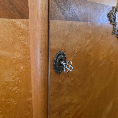 Wooden door with decorative keyhole and handle