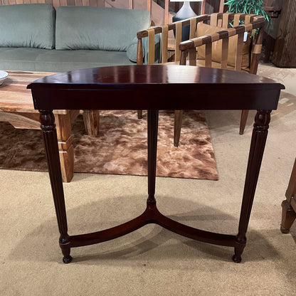 Wooden table in a room with furniture and decor