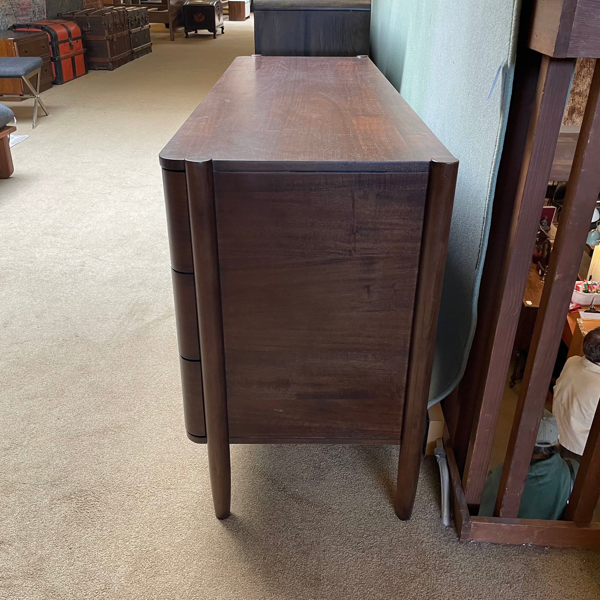 Wooden desk in a room with furniture and decor