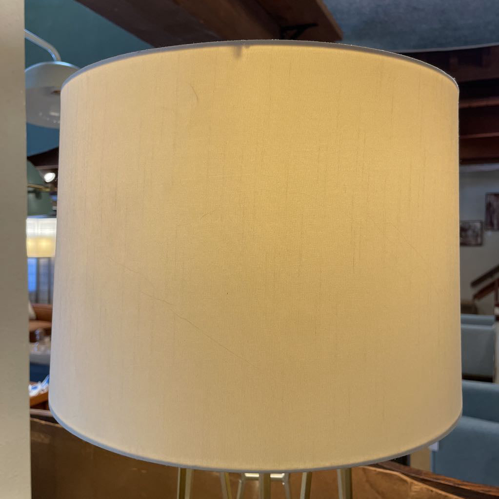 Beige lampshade on a blurred indoor background