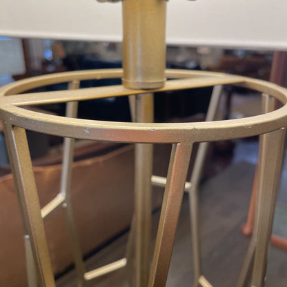 Gold metal stand with a blurred background