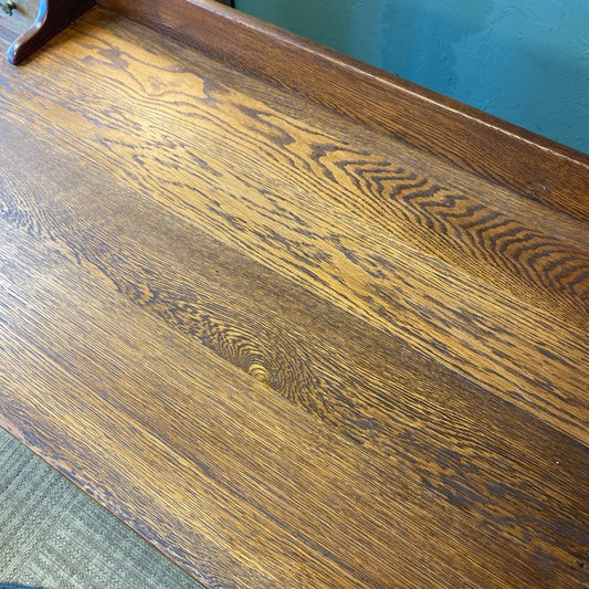 Close-up of a wooden surface with a visible grain pattern