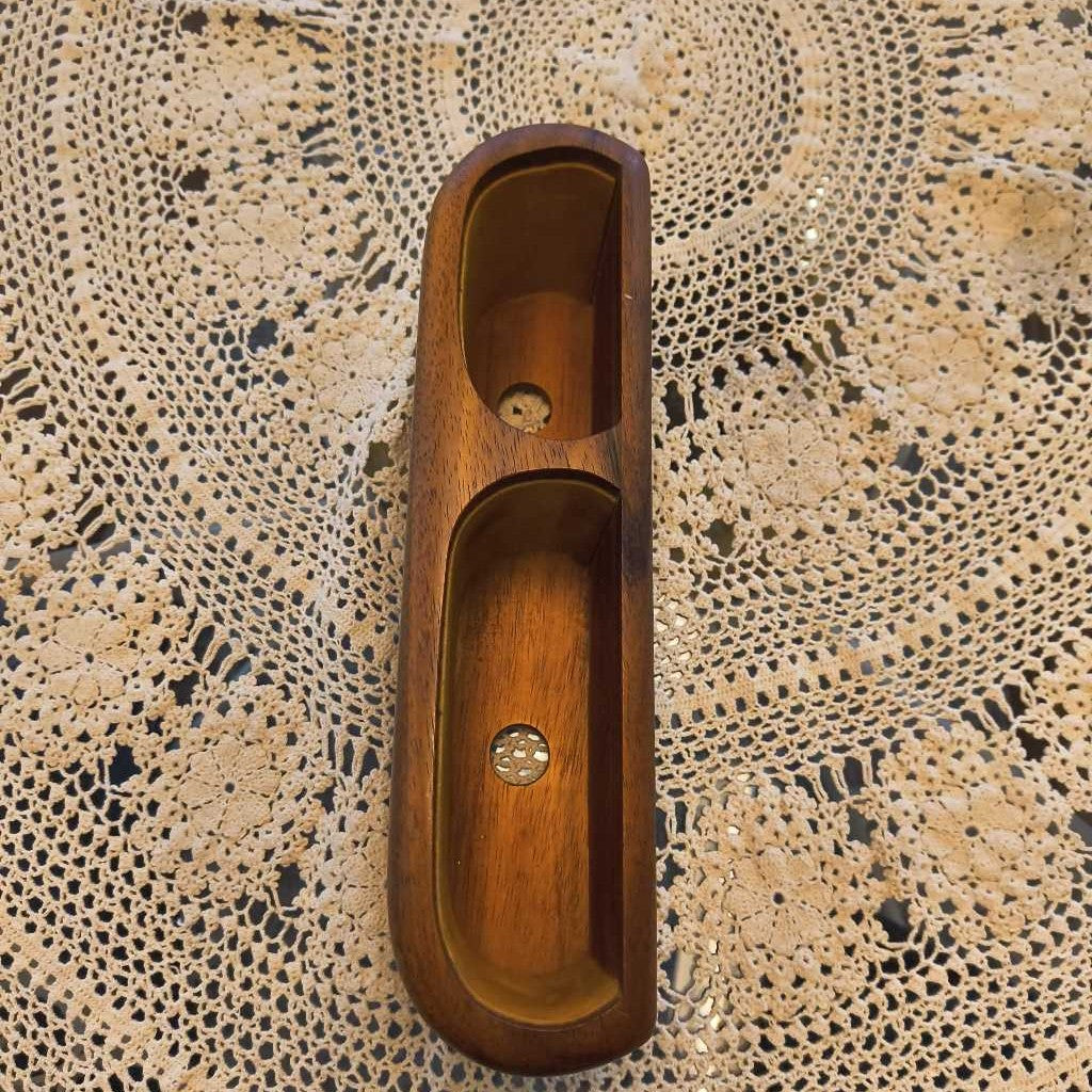 Wooden plane tool on a textured surface