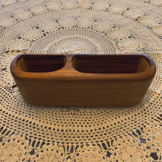 Wooden desk organizer on a textured surface