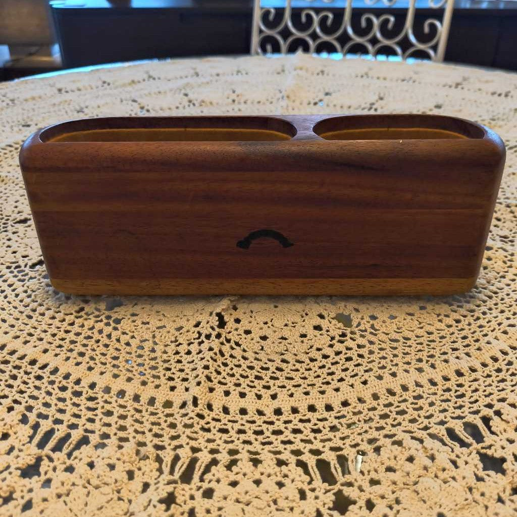 Wooden phone stand on a lace tablecloth